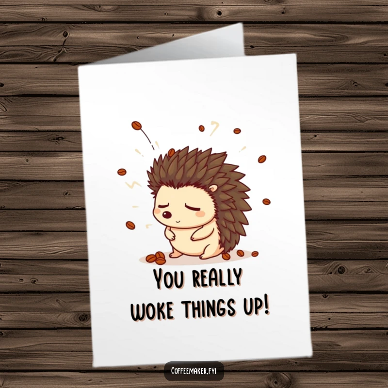 Funny Free Printable Congratulations Card: A sleepy hedgehog wearing a coffee bean hat jolts awake from a steam explosion. Congrats!