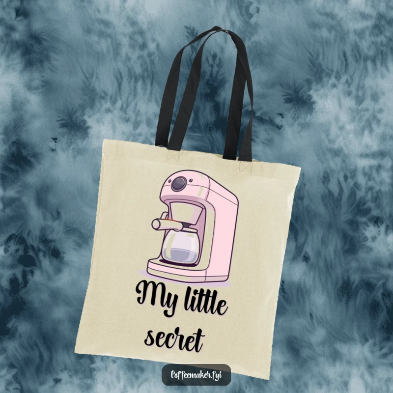 Funny tote bag with a winking coffee maker character, perfect for carrying essentials with a playful touch.